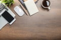 Flat lay of Office desk wooden table with laptop, and smartphone and equipment other office supplies Royalty Free Stock Photo