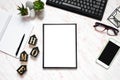 Flat lay office marble desk with phone, keyboard and notebook, frame for text space background