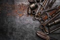 Flat lay Old hand tools ,Pliers screwdriver wrench rusted iron metal tools on Steel plate at garage Royalty Free Stock Photo