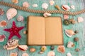 Notebook ,pencil and collection of sea shells, summer inspiration background Royalty Free Stock Photo