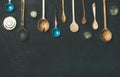 Flat-lay of old vintage kitchen spoons and baking tin molds