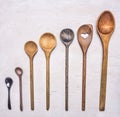 Flat lay of old wooden cooking spoons wooden rustic background top view close up Royalty Free Stock Photo