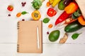 Flat lay paper shopping bag fresh vegetables and fruits, Shopping list food supermarket concept Royalty Free Stock Photo