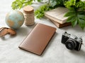 Flat lay passport and accessories like maps, compass, and tickets with vintage camera. AI Generated Royalty Free Stock Photo