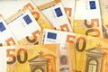 Flat lay pattern of 50 euro cash banknotes. Money background for financial and economy topics.