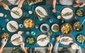 Flat-lay of people and cat eating fish and drinking beer Royalty Free Stock Photo