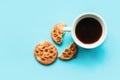 Flat lay photo with coffee cup and cookies with nuts