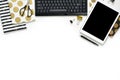 Flat lay photo of office white desk with tablet, keyboard and gold notebook copy space background