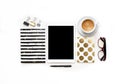 Flat lay photo of office white desk with tablet, keyboard and gold notebook copy space background