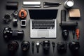 Flat lay photo of photographer equipment and laptop on black background, Flat lay of photographer\'s desk with laptop, camera Royalty Free Stock Photo