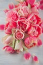 Flat lay with pink tulips and roses blossom flowers over white wood background, top view. Royalty Free Stock Photo