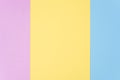 Flat lay, pink, yellow and blue paper pastel colors for texture