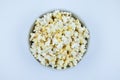 Flat lay of pop corn bowl on a white background,Top view