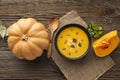 Flat lay pumpkin soup bowl with pumpkin. High quality and resolution beautiful photo concept Royalty Free Stock Photo