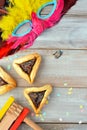 Flat lay of Purim Jewish holiday food and objects