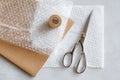 Flat Lay of Scissors, Bubble Wrap, and Craft Paper for Creative Packaging Mockup Royalty Free Stock Photo