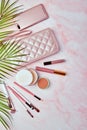 Flat lay with set of decorative cosmetics, makeup tools and feminine accessories