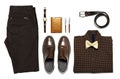 Flat lay set Men`s classic clothing, jacket pants shirt bow tie leather belt shoes wrist watch wallet pens umbrella cane car keys