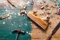 Flat lay set of vintage carpentry tools on colorful wooden background. Top view workbench with carpenter different tools. DIY, Royalty Free Stock Photo