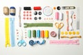 Flat lay with sewing supplies on white background Royalty Free Stock Photo
