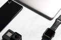 Flat Lay Shot Of Techno Items For Modern Worker With Smartwatch Mobile Phone And Action Camera Royalty Free Stock Photo