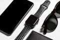 Flat Lay Shot Of Techno Items For Modern Worker With Smartwatch Mobile Phone And Sunglasses
