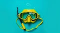 flat lay shot of yellow diving mask with snorkel blue background