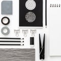 Flat lay skretch book with black office supplies on the white  background. Top view mockup. Royalty Free Stock Photo