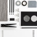 Flat lay skretch book with black office supplies on the white  background. Top view mockup. Royalty Free Stock Photo