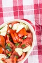 Flat lay sliced tomato and young onions salad on the table Royalty Free Stock Photo