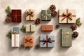 A flat lay of small assorted gift boxes tied with ribbons, pine cones, and fir branches on a textured background suggesting advent Royalty Free Stock Photo