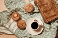 Flat lay of a snack with muffins, coffee and a good book Royalty Free Stock Photo