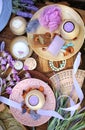 Flat lay spa accessories, handmade artisan soap, fresh flowers, wisp of bast, candles, bath salt Royalty Free Stock Photo