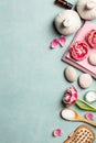 Flat lay of spa treatment set with pink flowers Royalty Free Stock Photo