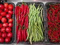 Flat Lay Spicy Red and Green Chilies in Baskets Royalty Free Stock Photo