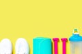 Flat Lay Sport and fitness equipment, pink dumbbells, sneakers, water blender bottle and mint yoga mat on yellow background. Top Royalty Free Stock Photo