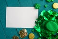 Flat Lay, St. Patrick`s Day, White Card For Congratulation. March 17, On A Green Background With Accesories For A Celebration, A