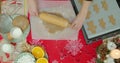 Flat lay. Step by step. Rolling out gingerbread cookie dough to bake Christmas cookies. Royalty Free Stock Photo