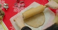 Flat lay. Step by step. Rolling out gingerbread cookie dough to bake Christmas cookies. Royalty Free Stock Photo