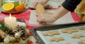 Flat lay. Step by step. Rolling out gingerbread cookie dough to bake Christmas cookies. Royalty Free Stock Photo