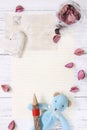 Flat lay stock photography purple flower petals letter envelope paper glass bottle bear doll wood pencil heart craft