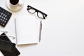 Flat lay style, Top view white table desk with copy space has black coffee, book, pencil, glasses, mobile is elements. Royalty Free Stock Photo