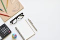 Flat lay style, Top view white table desk with copy space has book, pencil, glasses, calculator is elements. Royalty Free Stock Photo