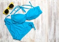 Flat lay of summer items with colorful bikini and accessories on white wooden background, Summer concept, Copy space Royalty Free Stock Photo