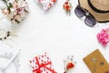 Flat lay table top view of decorations valentine`s day & summer travel hoilday background concept. Overhead shot items plan to