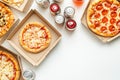 A flat lay of takeaway pizza boxes and soda cans arranged on a clean Royalty Free Stock Photo