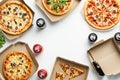 A flat lay of takeaway pizza boxes and soda cans arranged on a clean Royalty Free Stock Photo