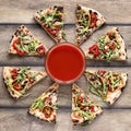 Flat lay tasty pizza on wooden background Photo