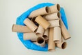 Flat lay with toilet paper tubes on table Royalty Free Stock Photo