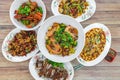 Flat lay top down view of table of authentic China Sichuan Hunan food. Assorted traditional dishes such as Fragrant Hotpot, crispy